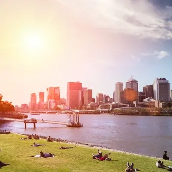 City river with people relaxing