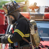 fire fighter with gas mask