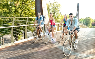 AdobeStock_321521366_riding bicycle in a city.jpeg