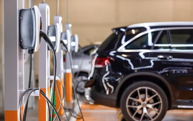 Electric vehicle charging stations in a car park