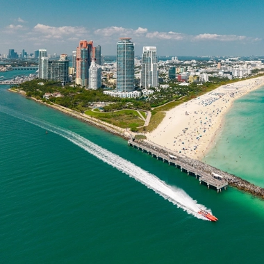 Beach and seawall with boat miami 5