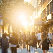 Diverse crowd of people walking on the street