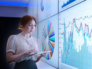 business advisor analysing visualized data on screen