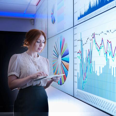 business advisor analysing visualized data on screen