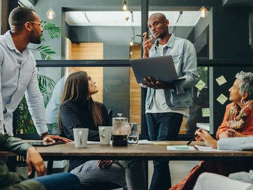 diverse group of employees having a meeting