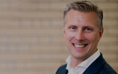 Professional headshot of Phil Archer