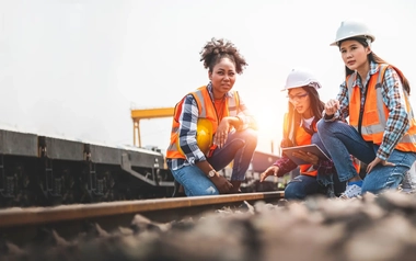 Women engineers working on a rail tracks