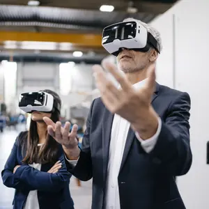  GettyImages_1090693116.jpg_Businessman and woman in high tech enterprise