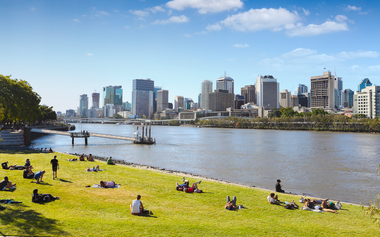 Brisbane city buildings and people at the park