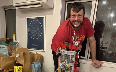 Dan Jones with a tall Lego building model