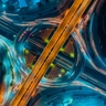 Aerial view of a multi-level highway interchange at night with light trails