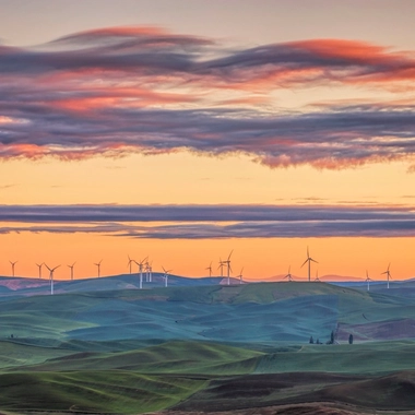 AdobeStock_860684601_Sunset-view-of-the-rolling-hills-of-the-Palouse-and-wind-turbines-seen-from-Steptoe-Butte