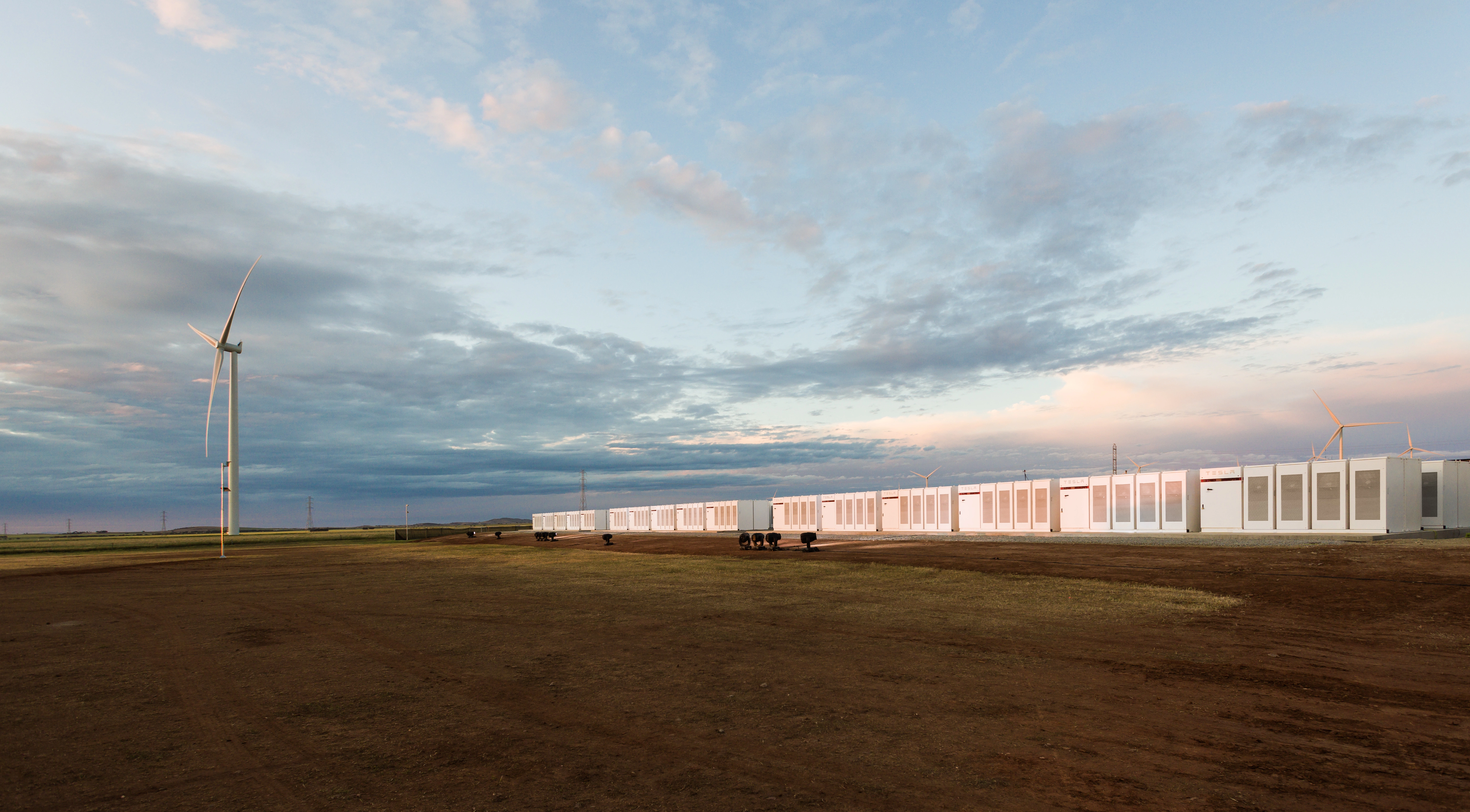 wind turbine and Tesla battery storage