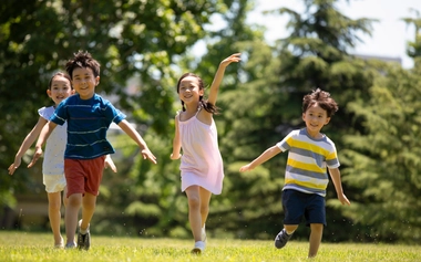 Happy children playing representing InfraCo community engagement