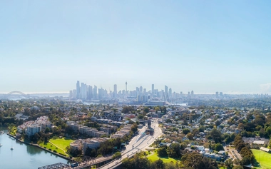 Aerial view of Sydney skyline and city buildings.