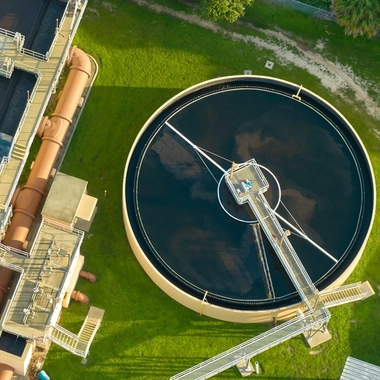 Aerial view of modern water cleaning facility at urban wastewater treatment plant.