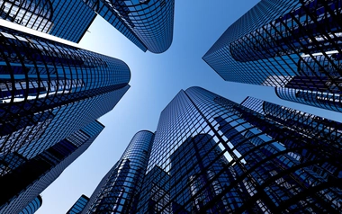 worm view of reflective skyscrapers