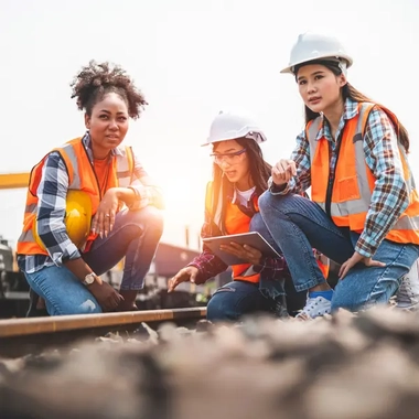 Women engineers working on a rail tracks