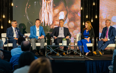 Tej Gidda and colleagues during a conference