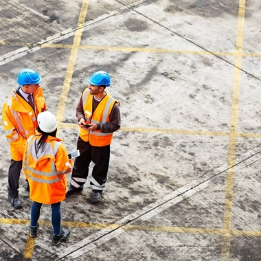 construction personnel and project engineers conducting a site inspection 