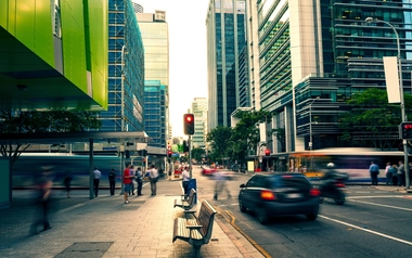 pedestrians and cars in city