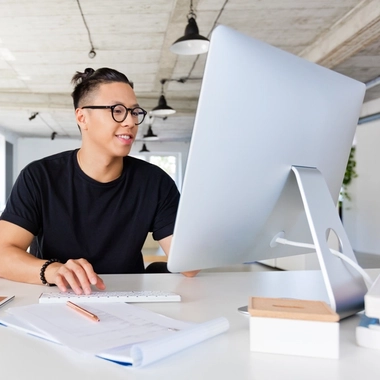 Young adult working on computer