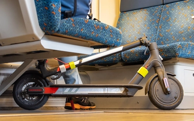 Electric Scooter on Train