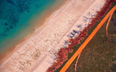 Aerial view of red sandy coastline at Dampier