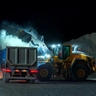 wheel loader loading a dump truck