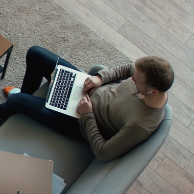 male employee working on his laptop