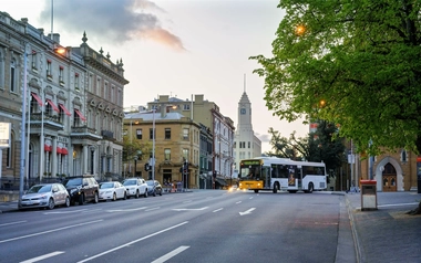 AdobeStock_708315163_Tasmanian-street-at-sunset-with-Metro-Tasmania-bus