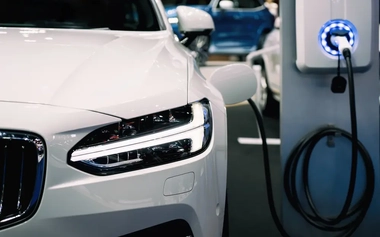 electric vehicle charging at a station