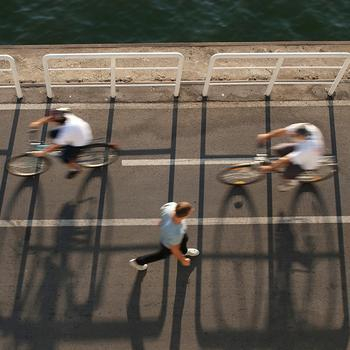 people biking and walking