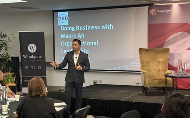 Lloyd Rakaupai presenting on doing business with Māori to an audience
