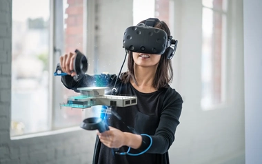 Woman playing with virtual reality headset