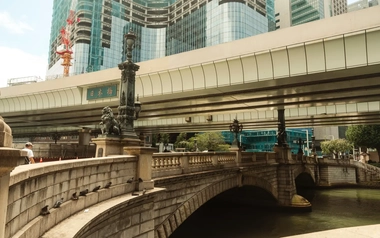 Bridge and train line covered by highway