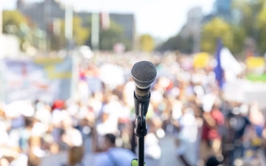 microphone in focus during a public event