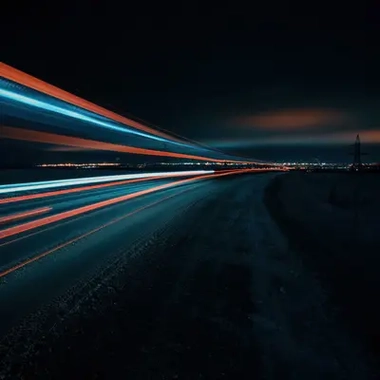 car lights on a highway at night