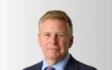 Professional headshot of David Bartholomew