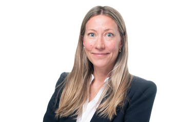 Professional headshot of Anna Jakobsen