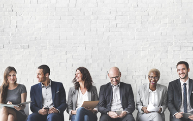Diverse group of employees sitting together
