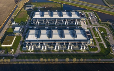 Aerial view of data centre buildings with cooling units and roads