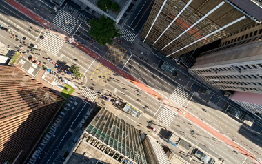 Aerial view of city streets and cars