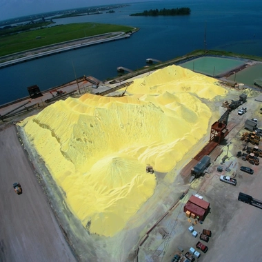Aerial view of bulk material handling within a port facility