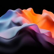 Abstract flowing waves in blue, purple and orange gradients on a black background.