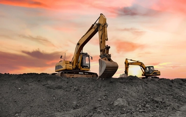 Excavator on earthmoving at open pit mining.
