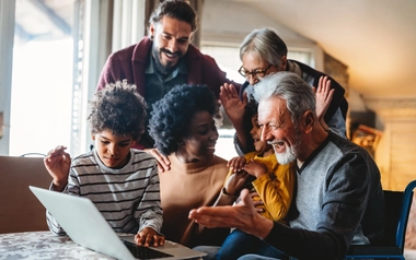 family looking at computer