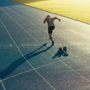 Athlete running on track