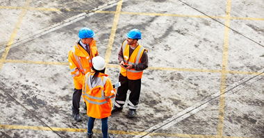 project engineer and construction personnel on site