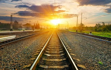 sunset over railway tracks
